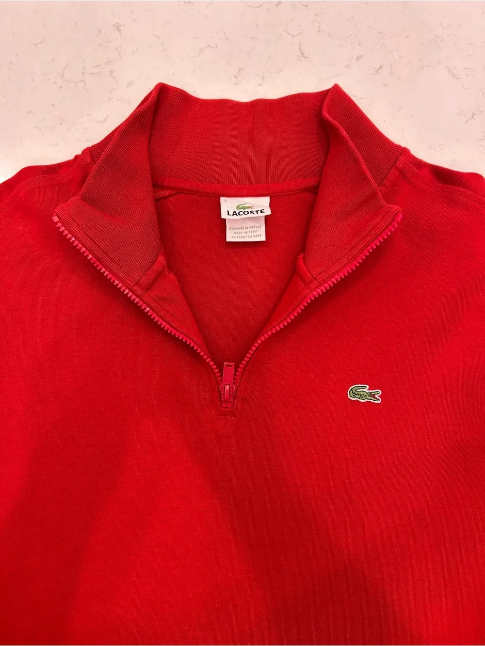 Lacoste pullover featuring